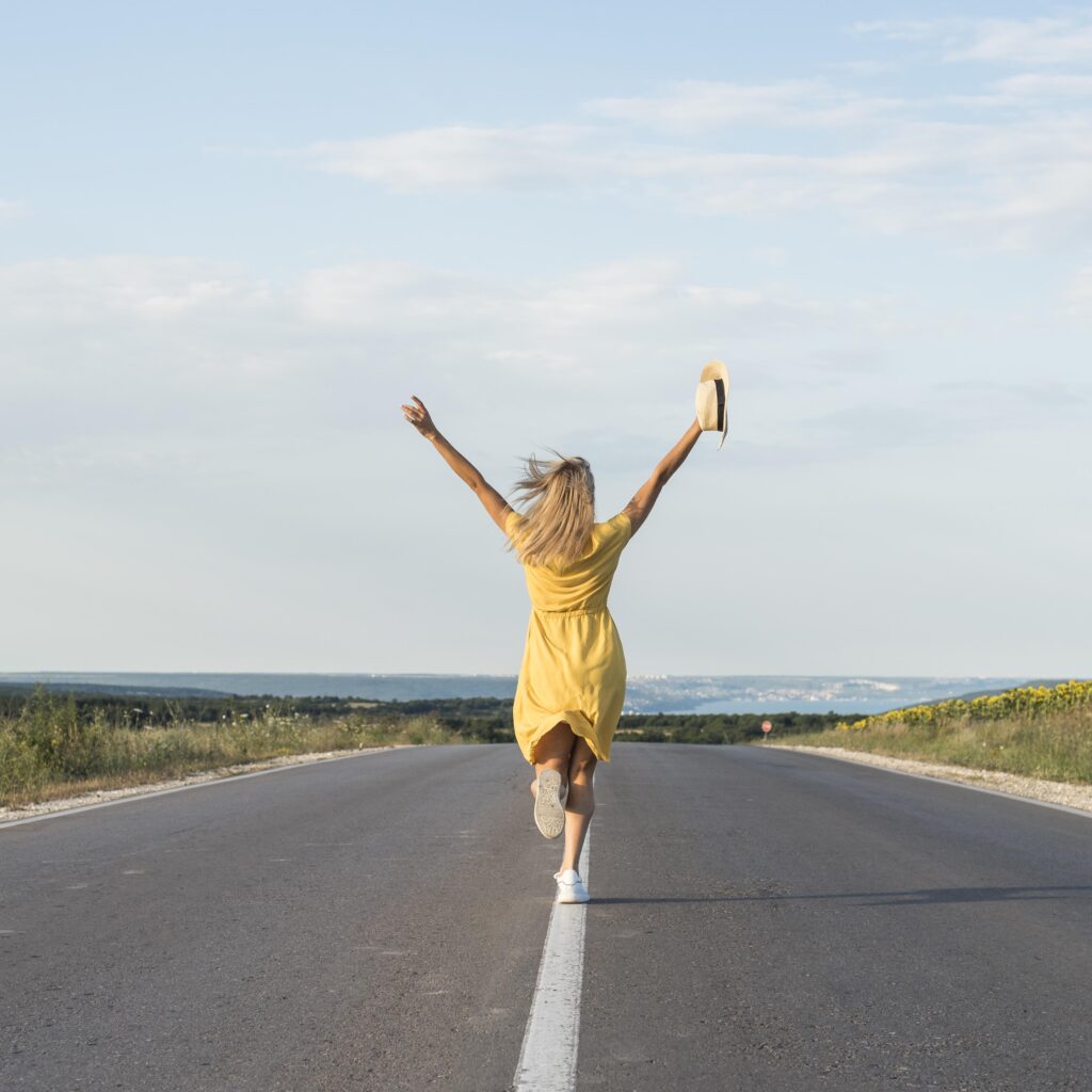 Girl running middle street